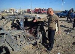 Dozens dead in string of Iraq blasts 