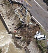 Floods in Japan kill 26, thousands remain cut off