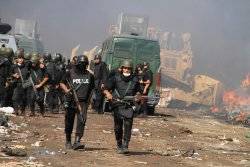 Egypt spreads blame for protest camp deaths 